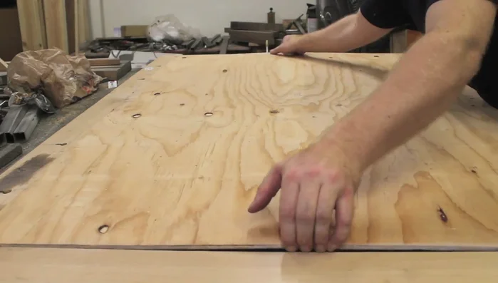 Attach the chalkboard backing to the frame.