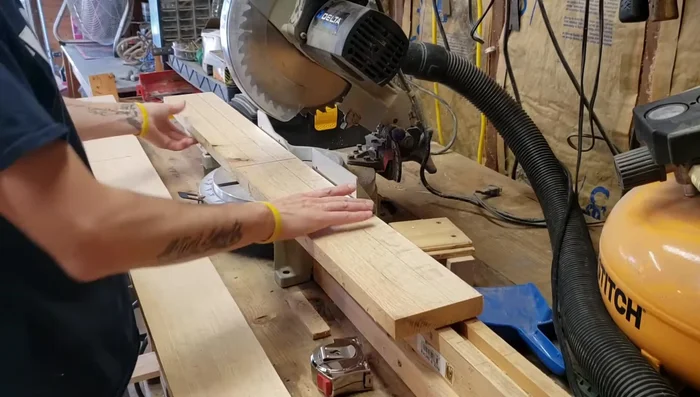 Cutting tapers on the legs using a tapering jig.