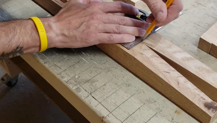 Cutting the shelf mortises (using Forstner bit and chisel).