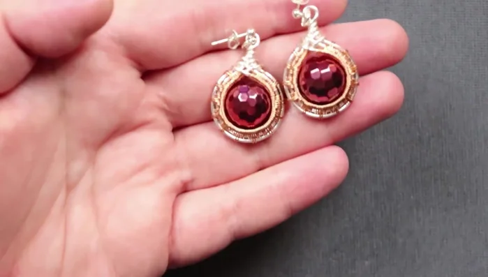 Attach earring findings: Attach the jump rings and earring findings to the loops.