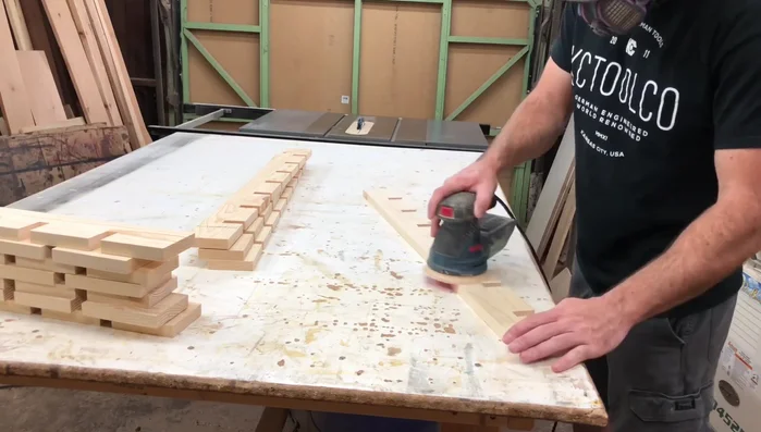 Use a chamfer bit to round the edges.