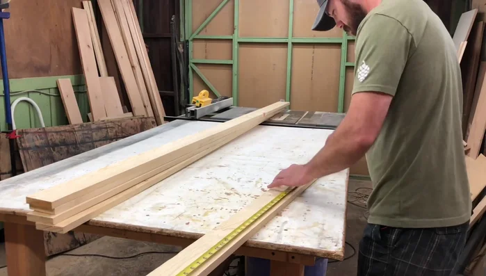 Rip the boards down to width using a table saw, ensuring straight edges.