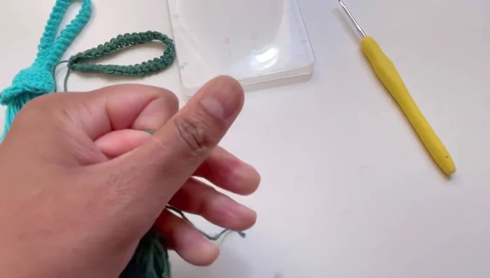 Weave in the ends and trim the tassel to your desired length.