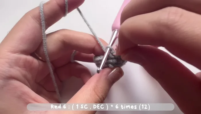 Round 8: One single crochet, one single crochet, one increase stitch. Repeat six times. Total of 24 stitches.