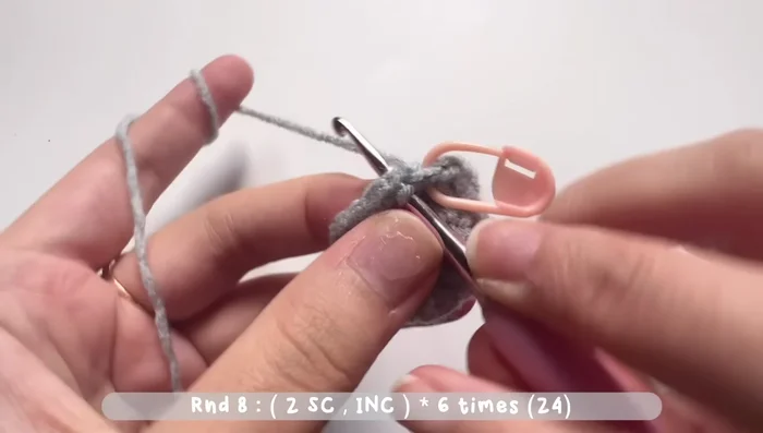 Round 8: One single crochet, one single crochet, one increase stitch. Repeat six times. Total of 24 stitches.