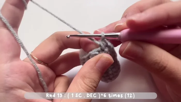 Last round: Six decrease stitches (or skip one stitch and single crochet the next). Total of six stitches. Sew the last round closed.