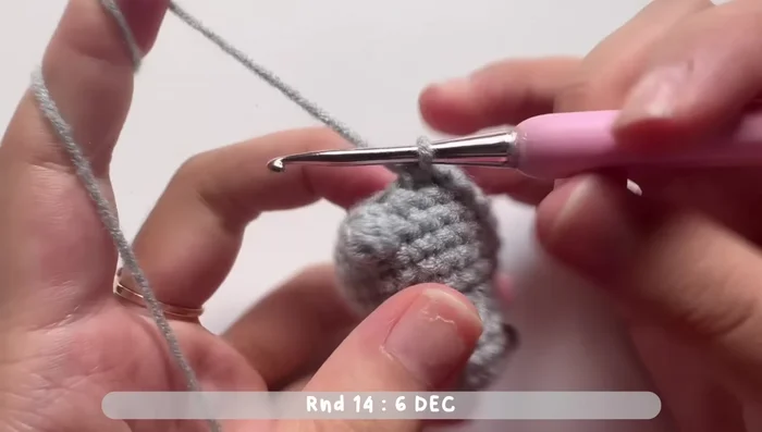 Last round: Six decrease stitches (or skip one stitch and single crochet the next). Total of six stitches. Sew the last round closed.