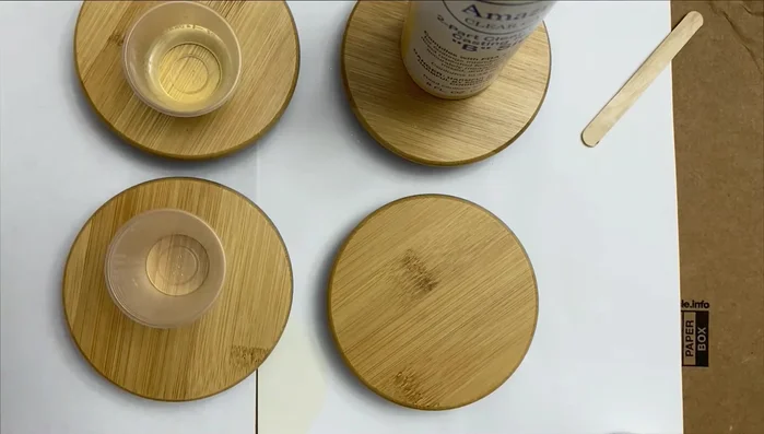 Add color and glitter: Incorporate acrylic paint (white and gray) and glitter directly into the mixed epoxy resin. Mix until well combined.