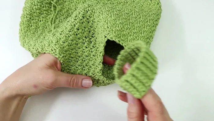 Attach leg hole ribbing to the romper, aligning seams. Secure with wonder clips, then sew using mattress stitch.