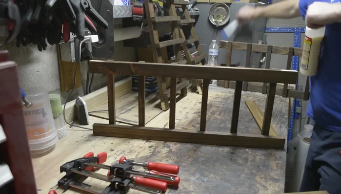 Attach the top using glue and clamps, allowing 3/8 inch overhang on sides.