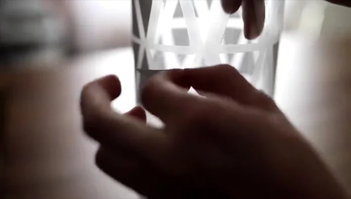 Remove the paper masks carefully to reveal the frosted glass design.