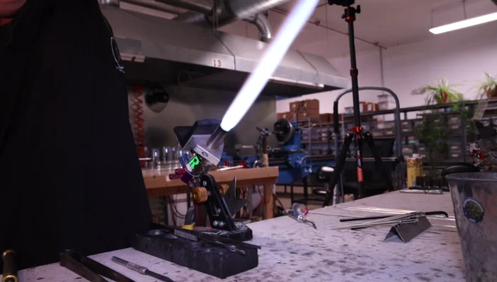 Heat the back of the pendant to prevent cracking before removing the punty.