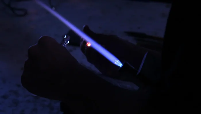 Gather black glass and attach it to the back of the Millie, ensuring it covers all edges.