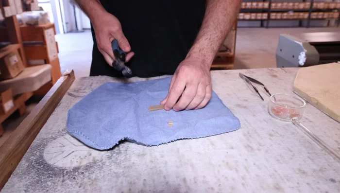 Place Millie chunks in a kiln and let them soak to avoid shocking them when applying flame.