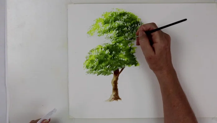 Use a small rigger brush to paint branches into the spaces left in the foliage, following their natural upward growth.