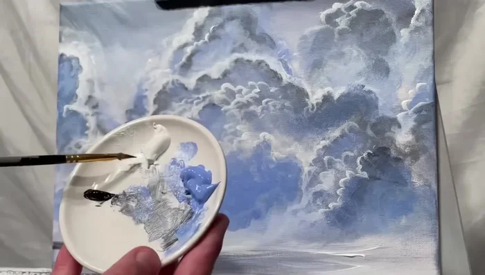 Add highlights in the water using white, blue, and other desired colors. Remember that shadows and highlights work together to create realism.