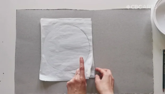Tape tissue paper together before cutting to avoid repetition.