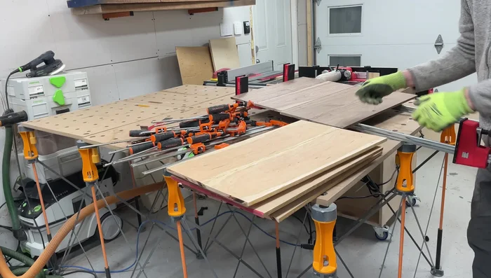 Remove excess glue and smooth edges with a scraper and 120-grit sandpaper.