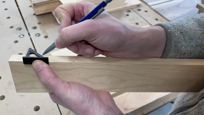 Round over the edges of the handles using a router.