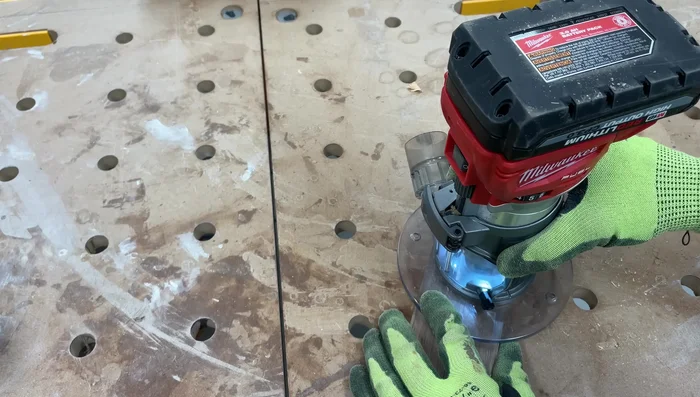 Round over the edges of the handles using a router.