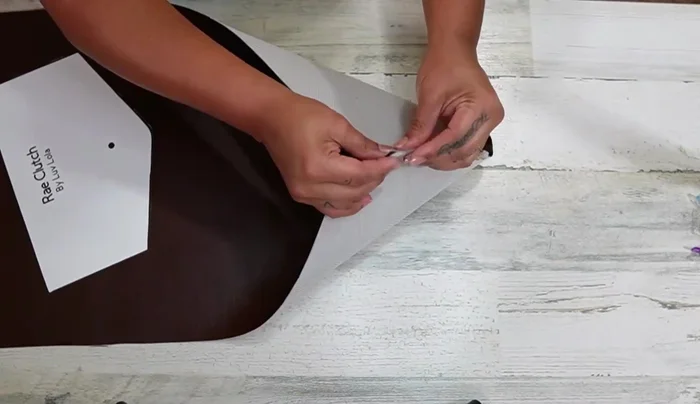 Cut the fabric to create the flap opening.