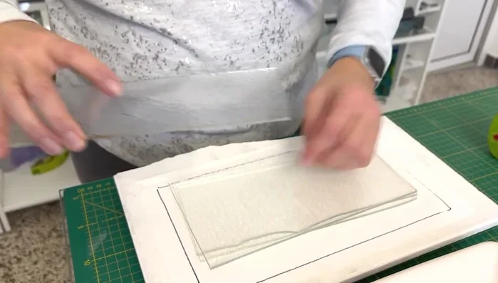 Prepare glass layers: Cut glass sheets to fit the mold, ensuring a good fit.