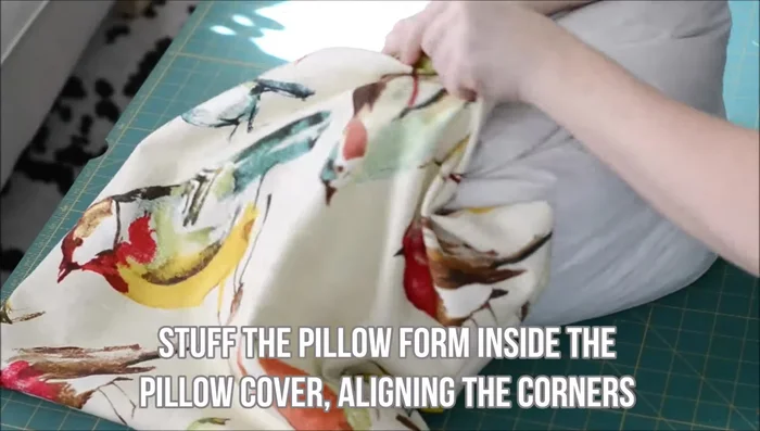 Stuff the pillow form inside, aligning corners.