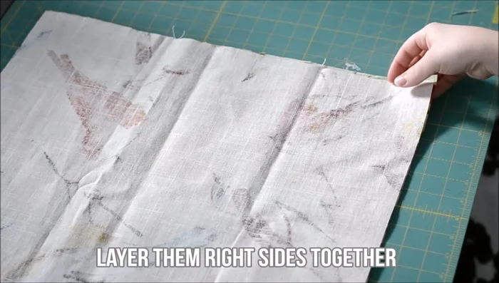 Layer fabric squares with right sides together. Align and pin corners and edges.