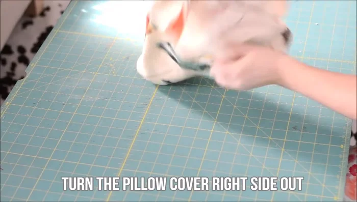 Turn the cover right side out and push out corners.