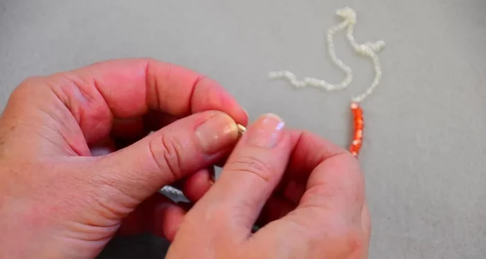 Close the jump rings securely.