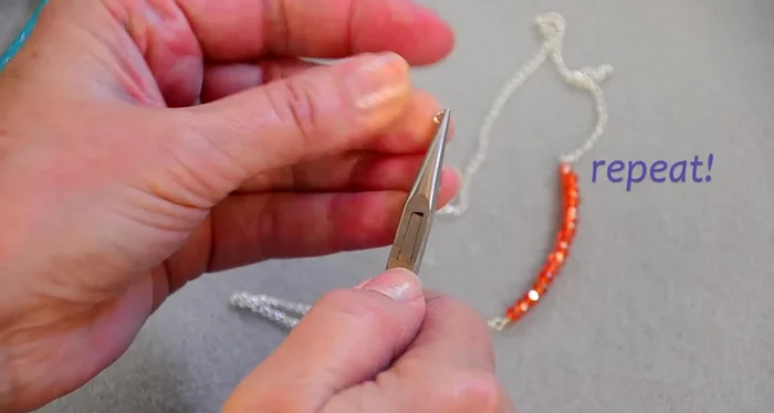 Close the jump rings securely.