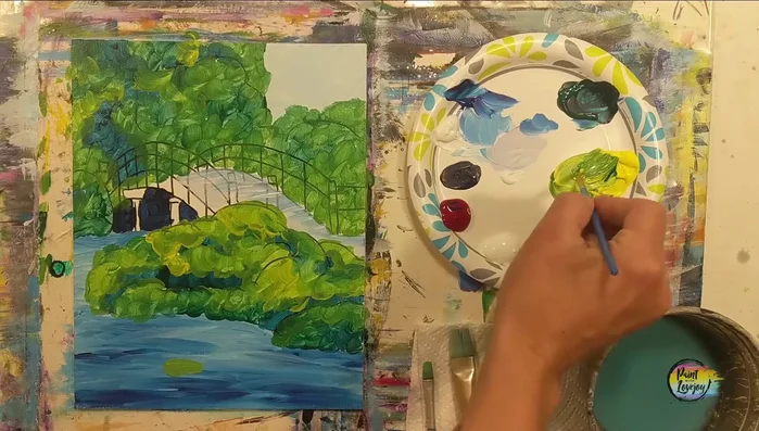 Add yellow-green lily pads to the water using a small pointy brush. Let previous layers dry first.