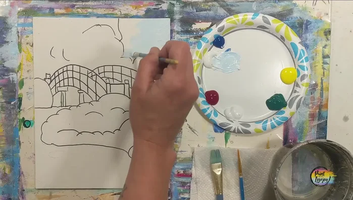 Mix a light blue (white + a little blue). Paint the sky and water areas using the medium flat brush. Add darker blue on top for depth, blending wet-on-wet.