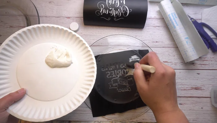 Rinse the plate thoroughly with warm water to remove any remaining Armor Etch. Carefully peel off any remaining vinyl.