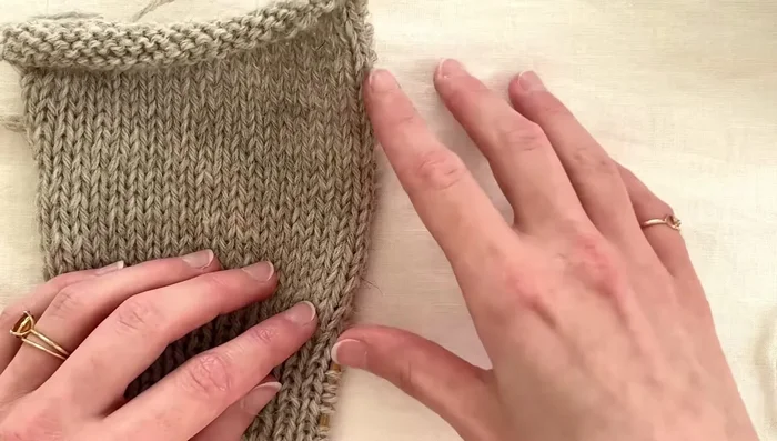 Plan buttonhole placement: Decide where you want your buttonholes and place stitch markers accordingly. Consider the cardigan's design (e.g., V-neck) and even spacing.