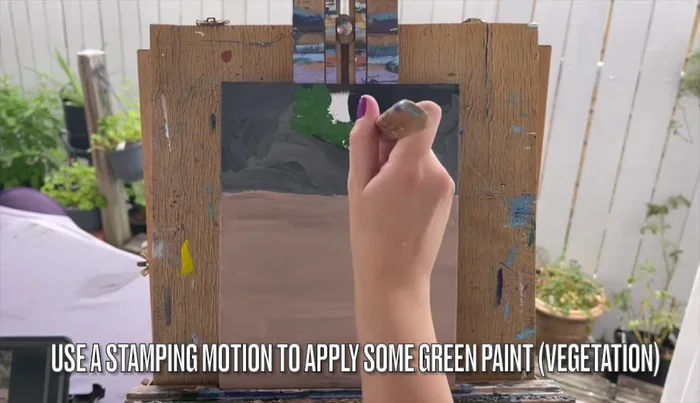 Use a bristle brush or old brush and green paint with a stamping motion to create vegetation.