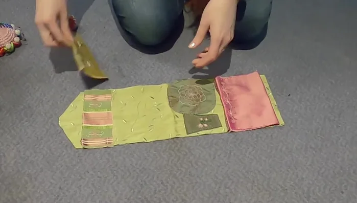 Attach the pockets to the lining piece, arranging them in the desired order.