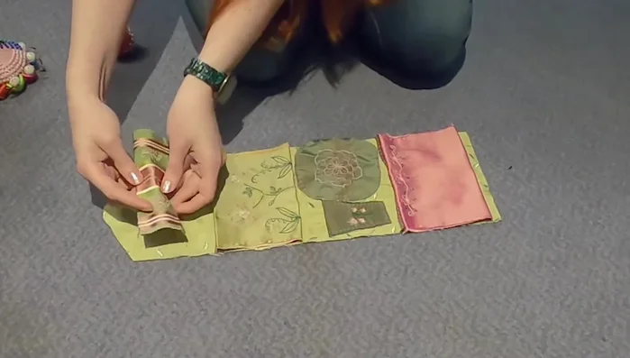 Attach the pockets to the lining piece, arranging them in the desired order.