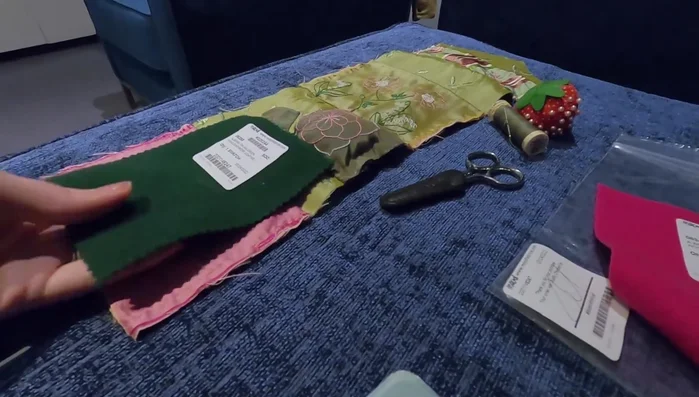 Attach the needle holders to the bottom of the lining.