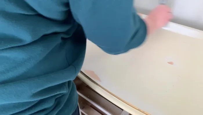 Prime the top with Dixie Belle Slick Stick, applying two coats and sanding in between. (Slick Stick offers better adhesion on slick surfaces than BIN).