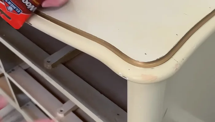 Sand down any excess wood filler.