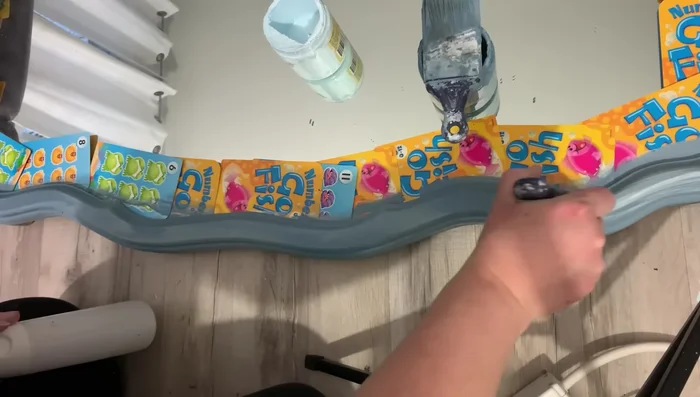 Highlight the inside of the mirror with Haint Blue, then blend with Dusty Blue for a soft transition.