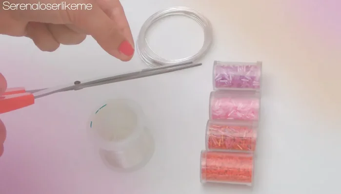 Prepare the nylon threads. Cut eight 1-meter long pieces of nylon thread.