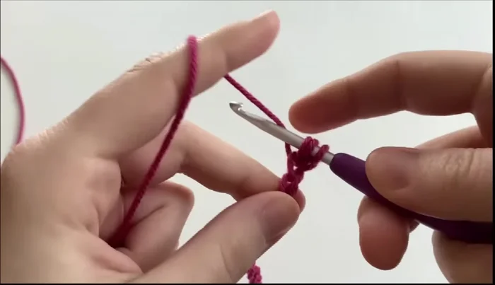 Repeat step 5 until you have six loops, then yarn over and pull through all six loops and chain one to finish the star stitch.