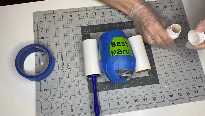 Let the etching cream sit for 10 minutes. Then, scrape off excess cream and rinse thoroughly with water flowing away from the unprotected glass.