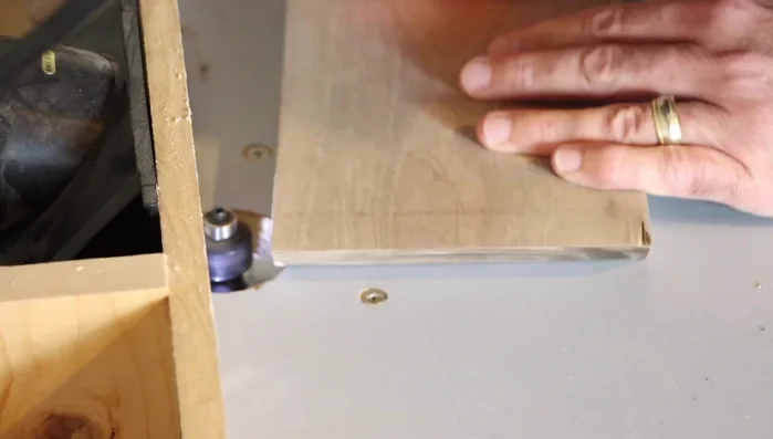 Create a 1/4 inch rabbet on the bottom of the box using a router table (optional).