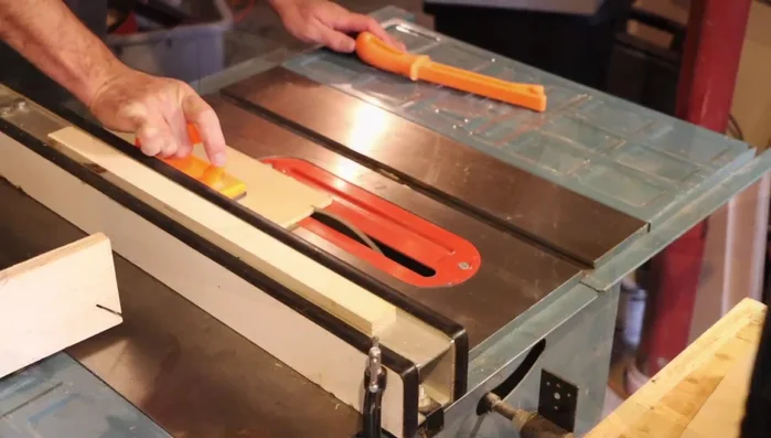 Apply packing tape to the bottom's cleats to prevent glue adhesion during the glue-up.