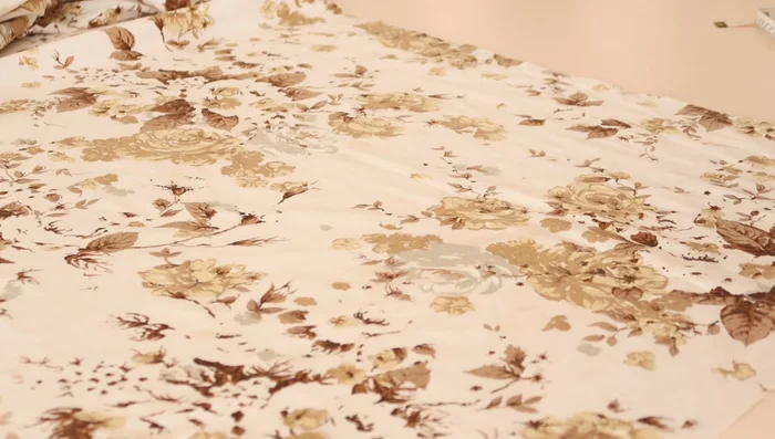 Cut fabric pieces: one 40x40cm square, one 30x40cm rectangle, one 15x40cm rectangle, and one 15cm x 4m ruffle rectangle (may need to stitch multiple pieces together).