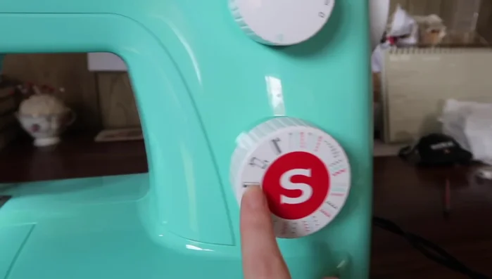 Try on the apron to check the fit and adjust gathers as needed.