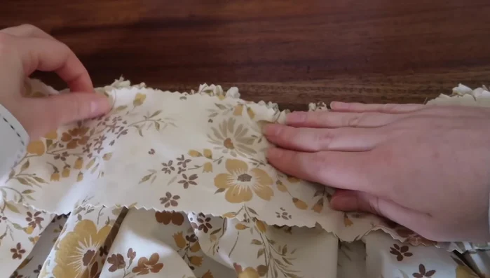 Try on the apron to check the fit and adjust gathers as needed.